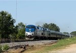 AMTK 77 leads a late train P092-27 past the Fairgrounds